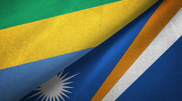 Gabon ve Marshall Adaları iki bayraktekstil kumaş, kumaş doku — Stok fotoğraf