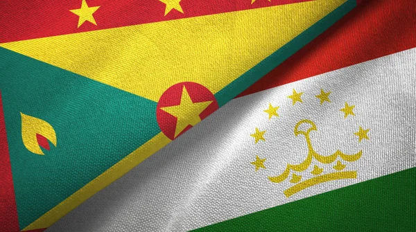 Grenada i Tadżykistan dwie flagi tkanina tekstylna, tekstura tkaniny — Zdjęcie stockowe