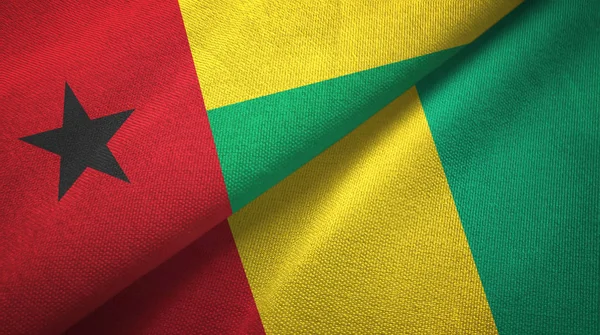 Guinea-Guinea és Guinea két zászló Textil szövet, szövet textúra — Stock Fotó