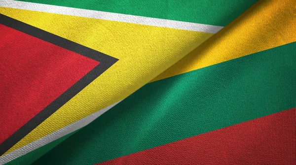 Guyana and Lithuania two flags textile cloth, fabric texture — Stock Photo, Image
