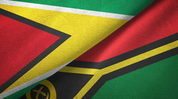Guyana and Vanuatu two flags textile cloth, fabric texture — Stock Photo, Image