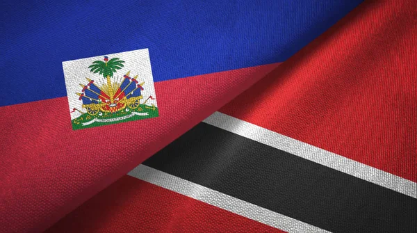 Haiti e Trinidad e Tobago due bandiere tessuto, tessitura tessuto — Foto Stock