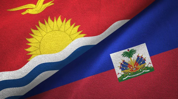 Kiribati en Haïti twee vlaggen textiel doek, weefsel textuur — Stockfoto