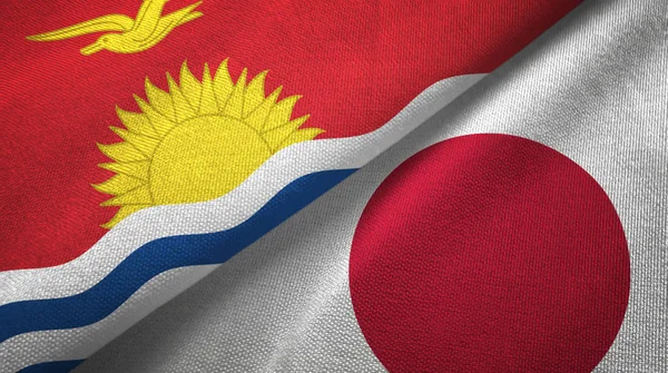 Kiribati y Japón dos banderas tela textil, textura de la tela — Foto de Stock