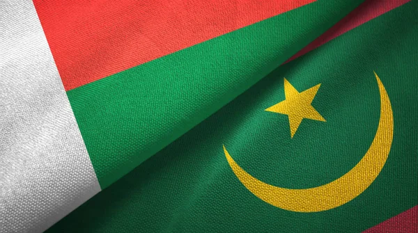 Madagascar and Mauritania two flags textile cloth, fabric texture