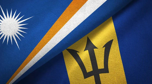 Marshall-szigetek és Barbados két zászló textil ruhával, szövet textúra — Stock Fotó
