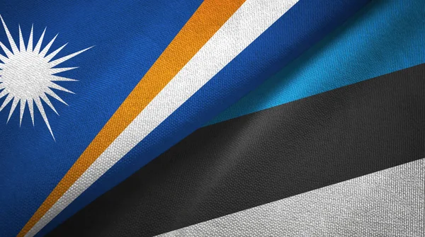 Marshall Islands and Estonia two flags textile cloth, fabric texture — Stock Photo, Image