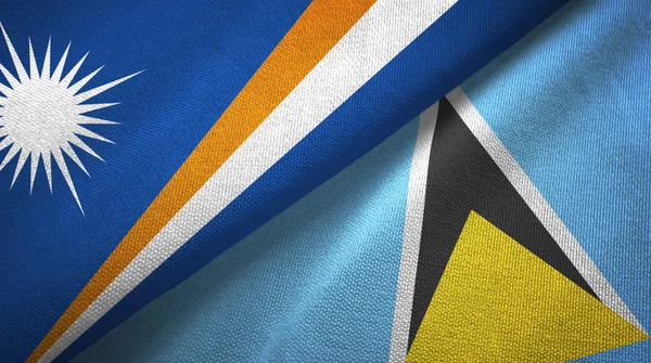 Ilhas Marshall e Santa Lúcia duas bandeiras pano têxtil, textura de tecido — Fotografia de Stock