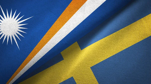 Νήσοι Μάρσαλ και Σουηδία δύο σημαίες ύφασμα υφασμάτων, υφή υφάσματος — Φωτογραφία Αρχείου