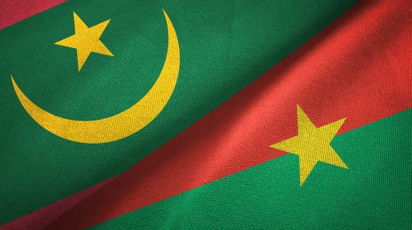 Moritanya ve Burkina Faso iki bayrak tekstil kumaş, kumaş doku — Stok fotoğraf