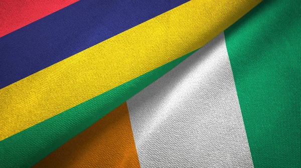 Mauritius och Cote Divoire Ivory Coast två flaggor textil tyg textur — Stockfoto