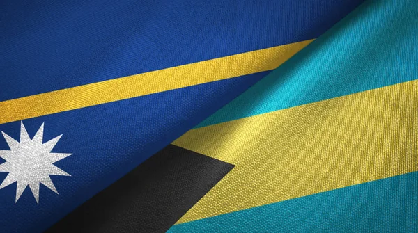 Nauru és Bahama-szigetek két zászló textil ruhával, szövet textúra — Stock Fotó