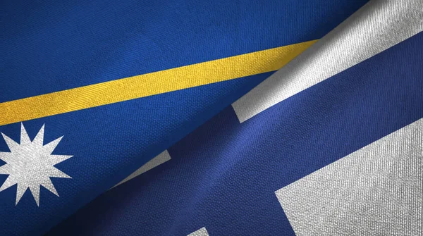 Nauru és Finnország két zászló textil ruhával, szövet textúra — Stock Fotó