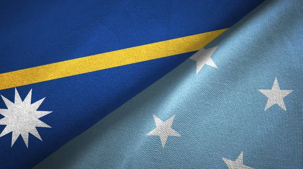 Nauru és Mikronézia két zászló textil ruhával, szövet textúra — Stock Fotó