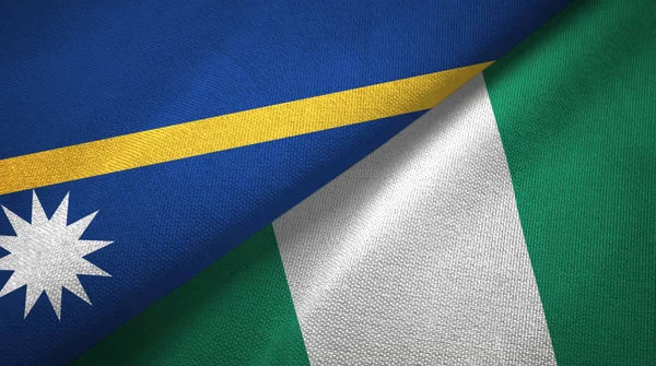 Nauru és Nigéria két zászló textil ruhával, szövet textúra — Stock Fotó