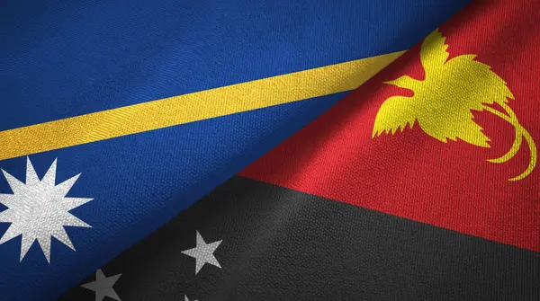Nauru és Pápua Új-Guinea két zászló Textil szövet, szövet textúra — Stock Fotó