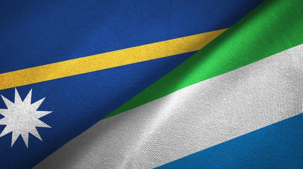 Nauru és Sierra Leone két zászló textil ruhával, szövet textúra — Stock Fotó