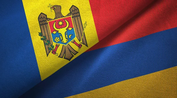 Moldávia e Armênia duas bandeiras de pano têxtil, textura de tecido — Fotografia de Stock