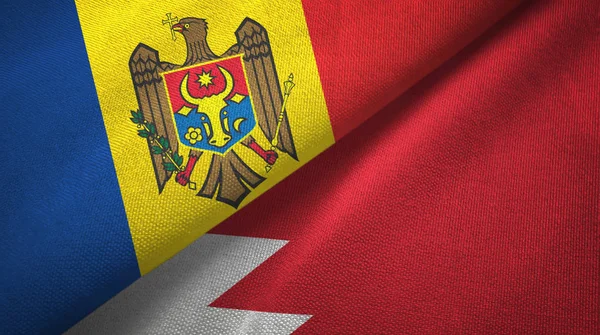 Moldova and Bahrain two flags textile cloth, fabric texture — Stock Photo, Image