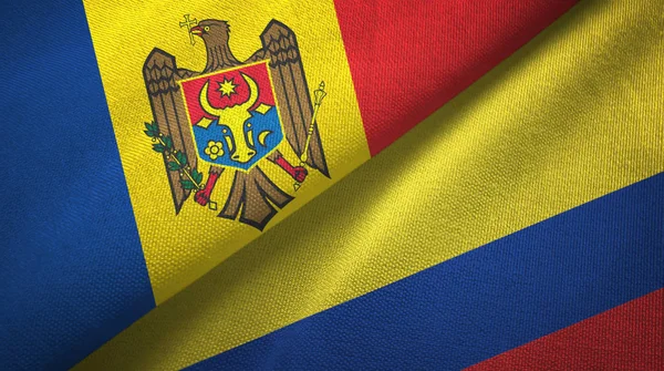 Moldova and Colombia two flags textile cloth, fabric texture — Stock Photo, Image