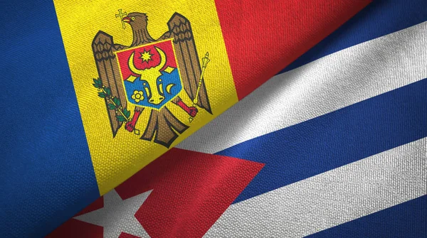 Moldavië en Cuba twee vlaggen textiel doek, weefsel textuur — Stockfoto