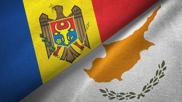 Moldavië en Cyprus twee vlaggen textiel doek, weefsel textuur — Stockfoto