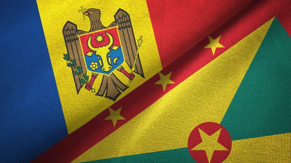 Moldavien och Grenada två flaggor textil tyg, tyg konsistens — Stockfoto