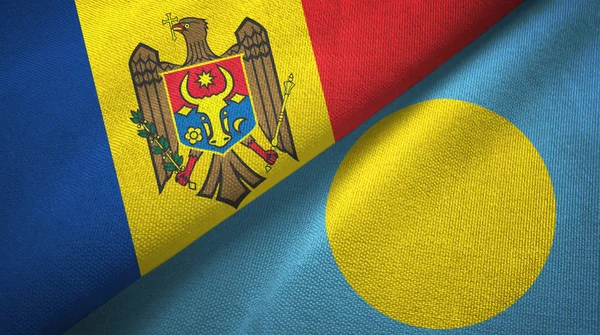 Moldavia y Palau dos banderas tela textil, textura de la tela — Foto de Stock