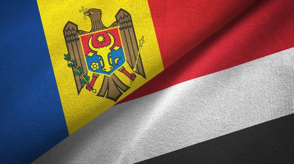 Moldavië en Jemen twee vlaggen textiel doek, weefsel textuur — Stockfoto