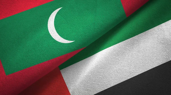 Maldives and United Arab Emirates two flags textile cloth, fabric texture — Stock Photo, Image