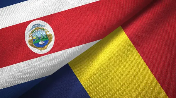 Costa Rica en Tsjaad twee vlaggen textiel doek, stof textuur — Stockfoto