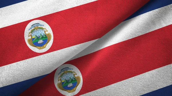 Costa Rica två flaggor textil tyg, tyg konsistens — Stockfoto