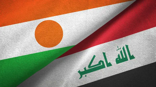 Niger und iraq zwei flaggen textiltuch — Stockfoto