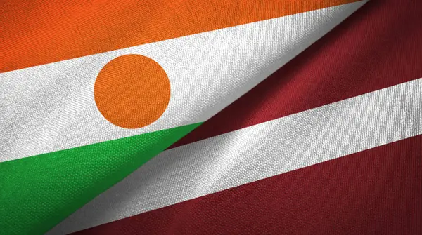 Νίγηρας και Λεττονίας δύο σημαίες υφαντικές ύλες, υφασμάτινη υφή — Φωτογραφία Αρχείου