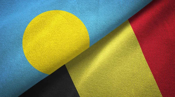 Palau en België twee vlaggen textiel doek, stof textuur — Stockfoto