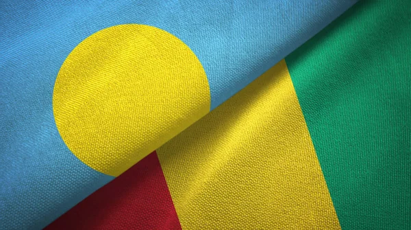 Palau a Guinea dvě vlajky textilní tkaniny, textura textilií — Stock fotografie