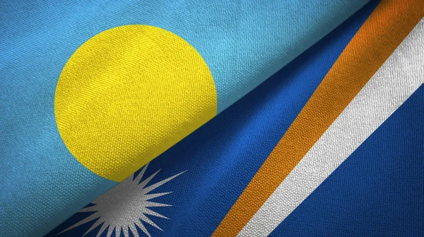 Palau and Marshall Islands two flags textile cloth, fabric texture — Stock Photo, Image