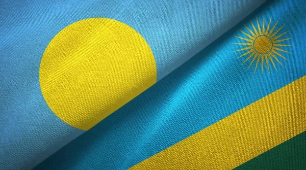 Palau ve Ruanda iki bayrak tekstil kumaş, kumaş doku — Stok fotoğraf