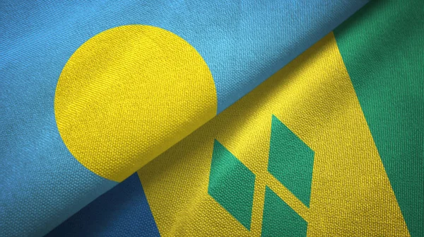 Παλάου και Άγιος Βικέντιος και Γρεναδίνες δύο σημαίες υφαντικών υφασμάτων — Φωτογραφία Αρχείου