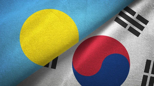 Palau e Corea del Sud due bandiere tessuto, tessitura del tessuto — Foto Stock