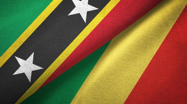 São Cristóvão e Nevis e Congo duas bandeiras de pano têxtil, textura de tecido — Fotografia de Stock