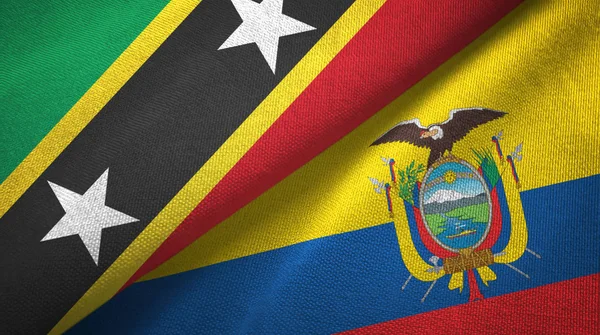 Saint Kitts en Nevis en Ecuador twee vlaggen textiel doek, stof textuur — Stockfoto