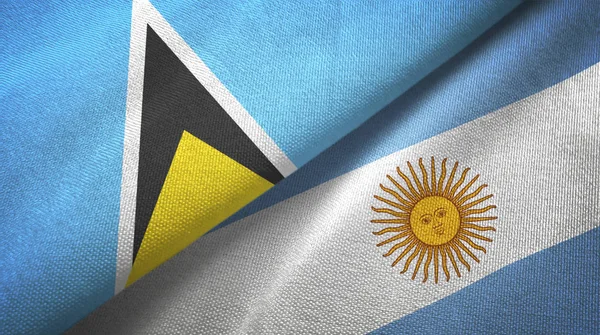 Сент-Люсия и Аргентина два флага текстильная ткань, текстура ткани — стоковое фото