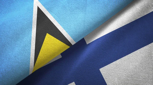 Santa Lúcia e Finlândia duas bandeiras pano têxtil, textura de tecido — Fotografia de Stock