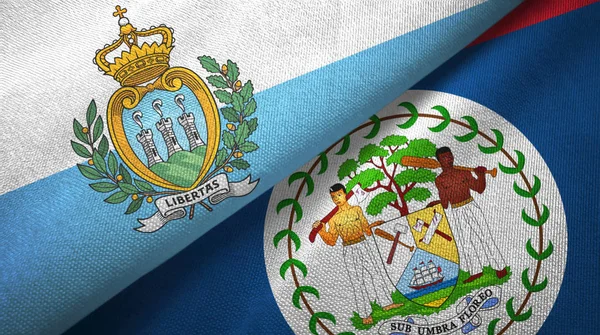 San Marino e Belize due bandiere tessuto, tessitura tessuto — Foto Stock