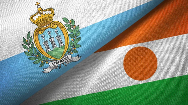 San Marino y Níger dos banderas tela textil, textura de la tela — Foto de Stock