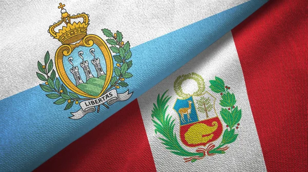 San Marino en Peru twee vlaggen textiel doek, weefsel textuur — Stockfoto