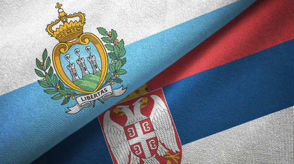 San Marino a Srbsko dvě vlajky textilní tkaniny, textura textilií — Stock fotografie