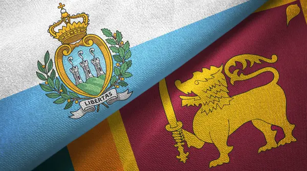 San Marino e Sri Lanka duas bandeiras de pano têxtil, textura de tecido — Fotografia de Stock