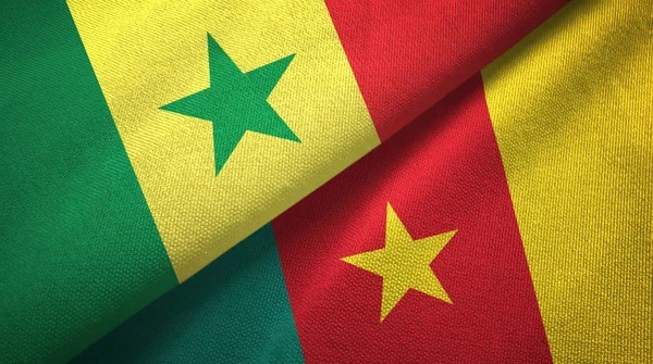 Szenegál és Kamerun két zászló textil ruhával, szövet textúra — Stock Fotó